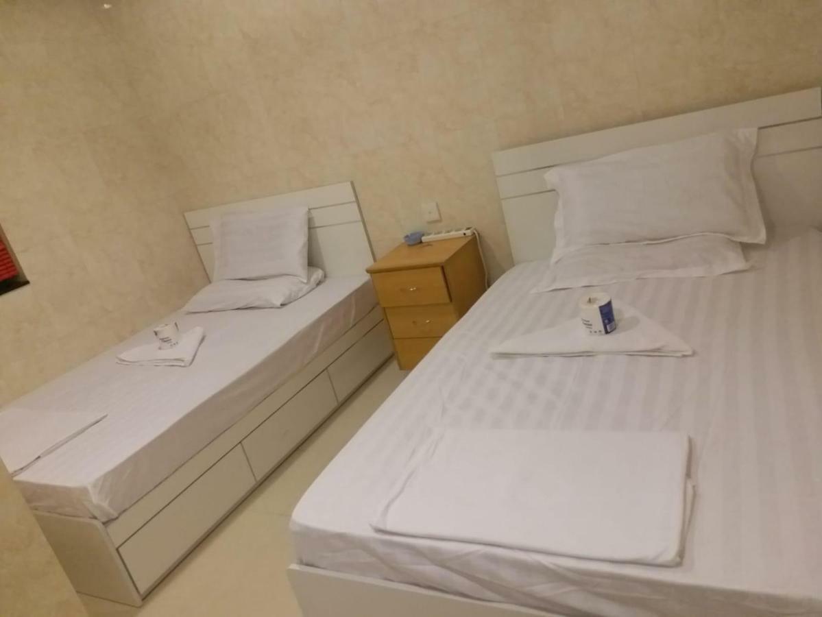 Capital Guest House Цзюлун Экстерьер фото