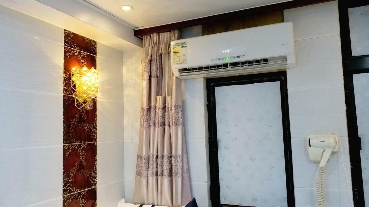 Capital Guest House Цзюлун Экстерьер фото