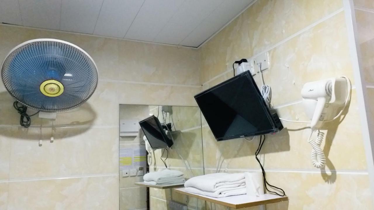 Capital Guest House Цзюлун Экстерьер фото
